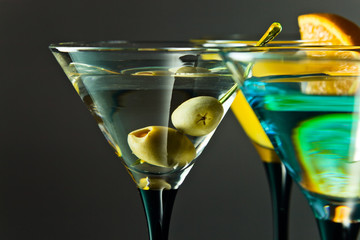 martini with green olives