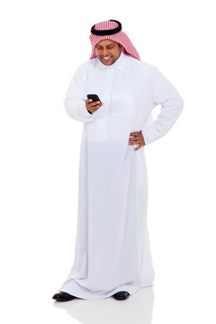 arab man reading email on smart phone