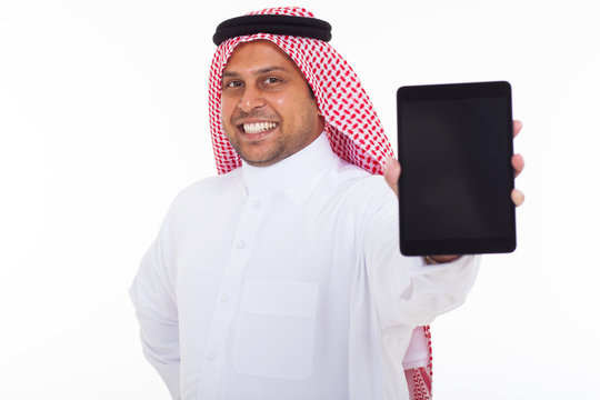 muslim man showing tablet computer