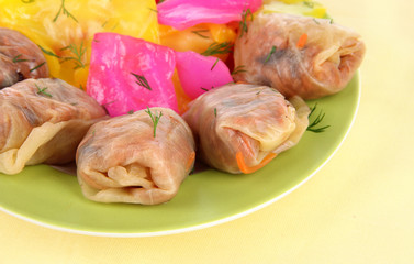 Stuffed cabbage rolls on beige background close-up