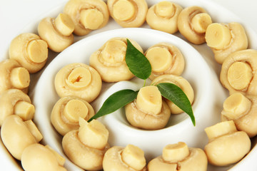 Mushrooms in bowl, close up