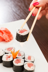 sushi with chopsticks