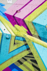 Colorful graffiti, abstract grunge grafiti background over textu