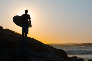Surfer watching the waves