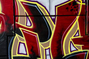 Naklejka premium Red and golden urban art, colorful graffiti, abstract grunge gra