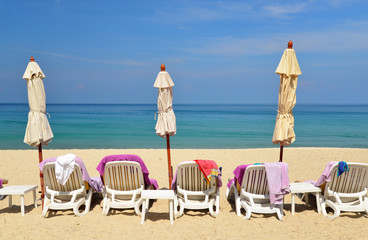 Beach chairs on tropical white sand beach,thailand