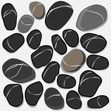 Dark pebbles on a white background