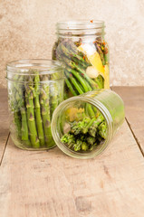 Jars of asparagus being canned