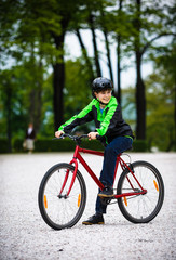 Urban biking - teenage boy and bike in city