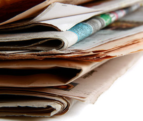 Stack of newspapers on the desk