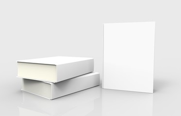 Three white books with blank covers