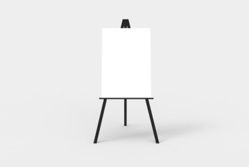 A black easel with a blank white canvas on it. - obrazy, fototapety, plakaty