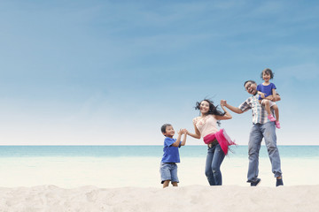 Happy family at beach