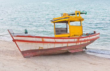 Small fishery boat on the beach