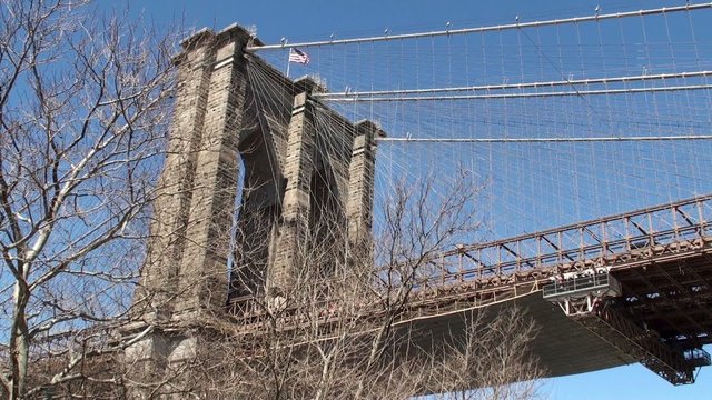 US flag over Brooklyn Bridge, NYC
