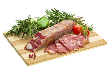 Salami with rosemary, basil and tomato