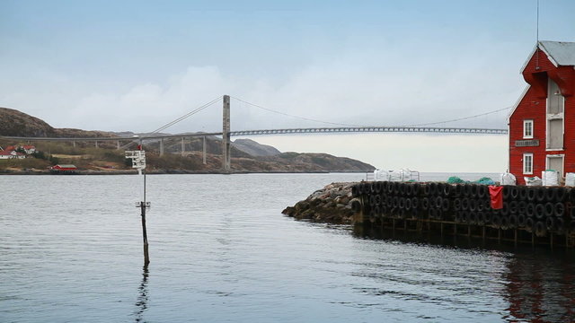 Norwegian landscape with bridge and navigation mark