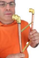 Plumber with copper pipes