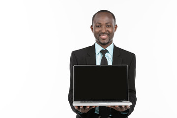 Businessman presenting on laptop