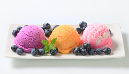 Assorted ice cream with fresh blueberries