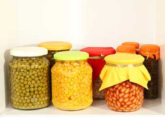 Different conservations on white shelf