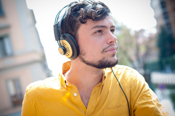 hipster young man listening to music