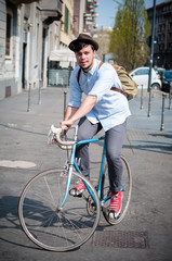 hipster young man on bike