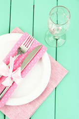Table setting in white and pink tones