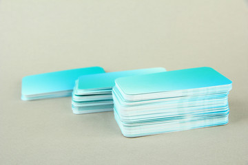 Stack of business cards, on color background