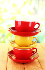 Three cups on nature background