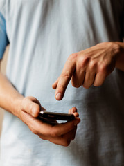 man uses a mobile phone