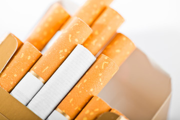 Tobacco in cigarettes with a brown filter