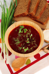Delicious borsch on table close-up
