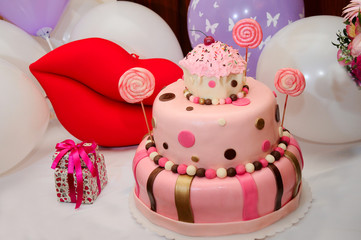 Wonderful birthday cake over balloons background