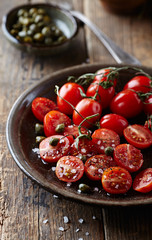 Cherry tomatoes with capers and sea salt