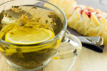 Tea with  a  jam bun