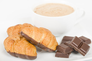 Pain au Chocolat - Chocolate croissants and cappuccino.