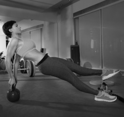 Crossfit fitness woman push ups kettlebell pushup exercise