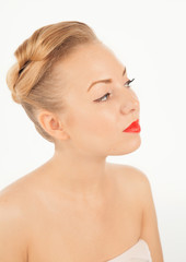 Young woman with red lips and manicure