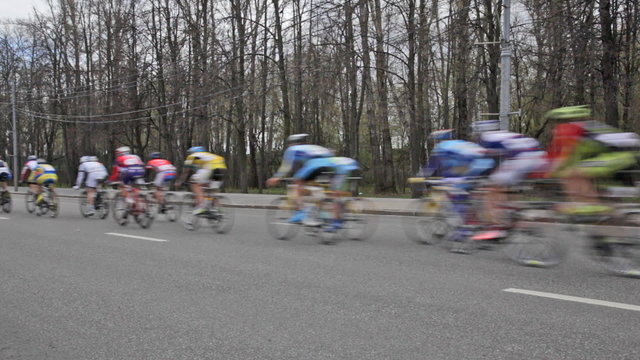 Group of cyclists in action during a cycling tour