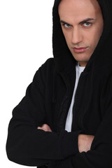 Fototapeta premium Portrait of hooded man