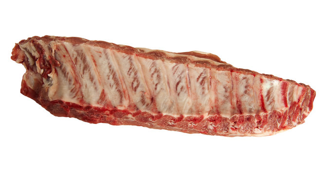 fresh raw baby back ribs on a white background