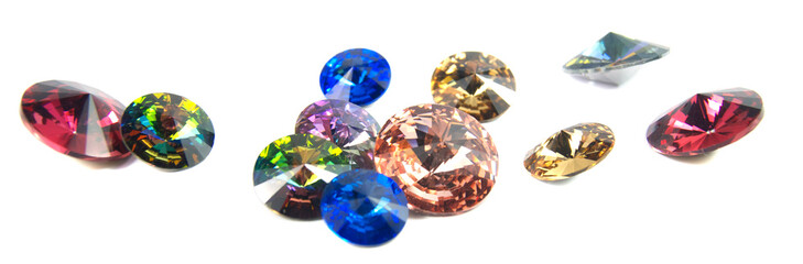 Bright gems isolated on white background