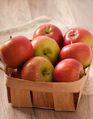Ripe red apples on a wooden backgrounds