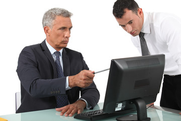 businessman giving explanations to his boss