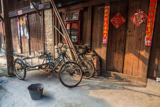 Fototapeta Traditional chinese street view with bikes