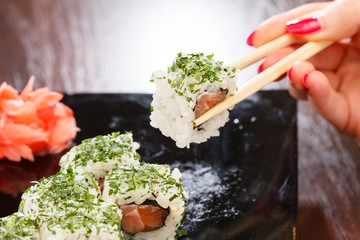 sushi with chopsticks
