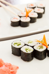sushi with chopsticks