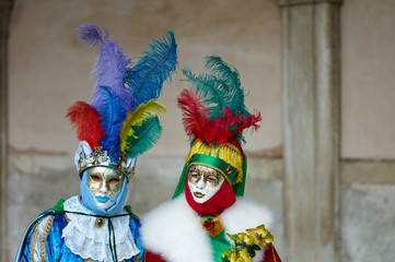Venetian costume attends Carnival of Venice.