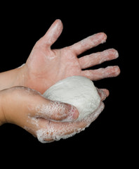 Lathered hands and soap